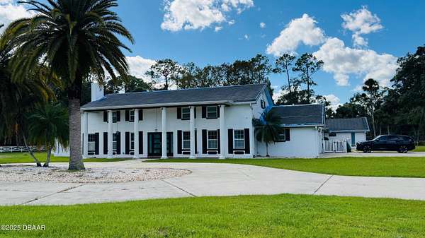 5 Acres of Residential Land with Home for Sale in Port Orange, Florida