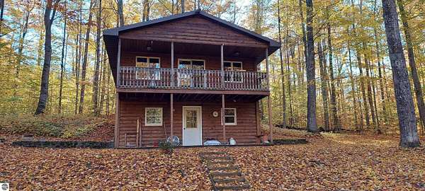 10 Acres of Residential Land with Home for Sale in Mancelona, Michigan