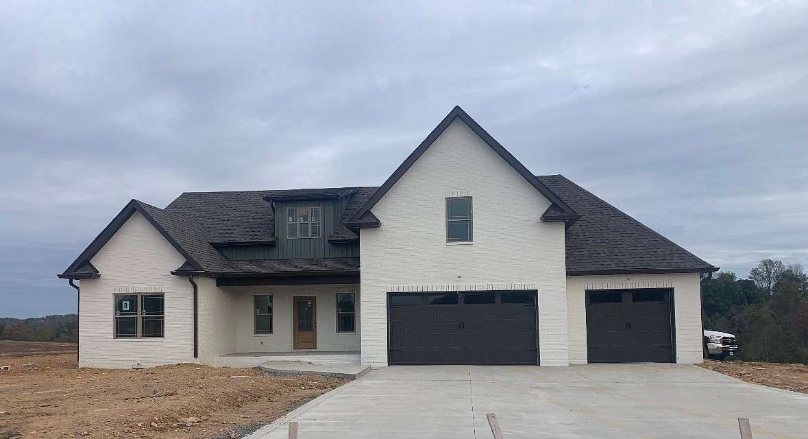 1.5 Acres of Residential Land with Home for Sale in Woodlawn, Tennessee