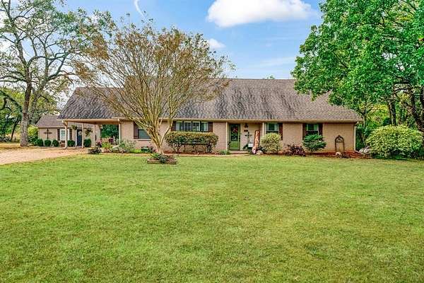 2 Acres of Land with Home for Sale in Paris, Texas