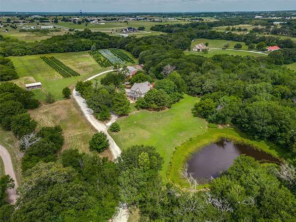 22.8 Acres of Agricultural Land with Home for Sale in Cross Roads, Texas
