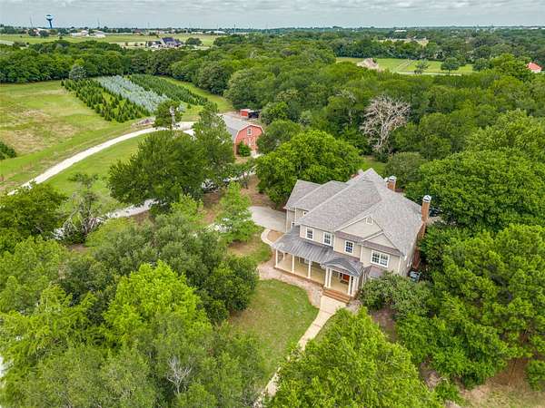 22.8 Acres of Agricultural Land with Home for Sale in Cross Roads, Texas