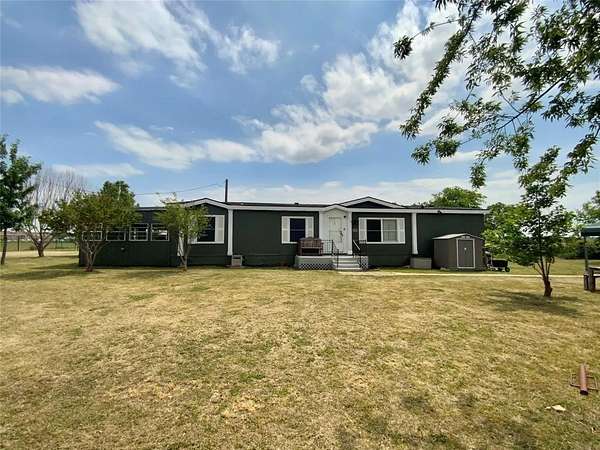 2.5 Acres of Residential Land with Home for Lease in Justin, Texas