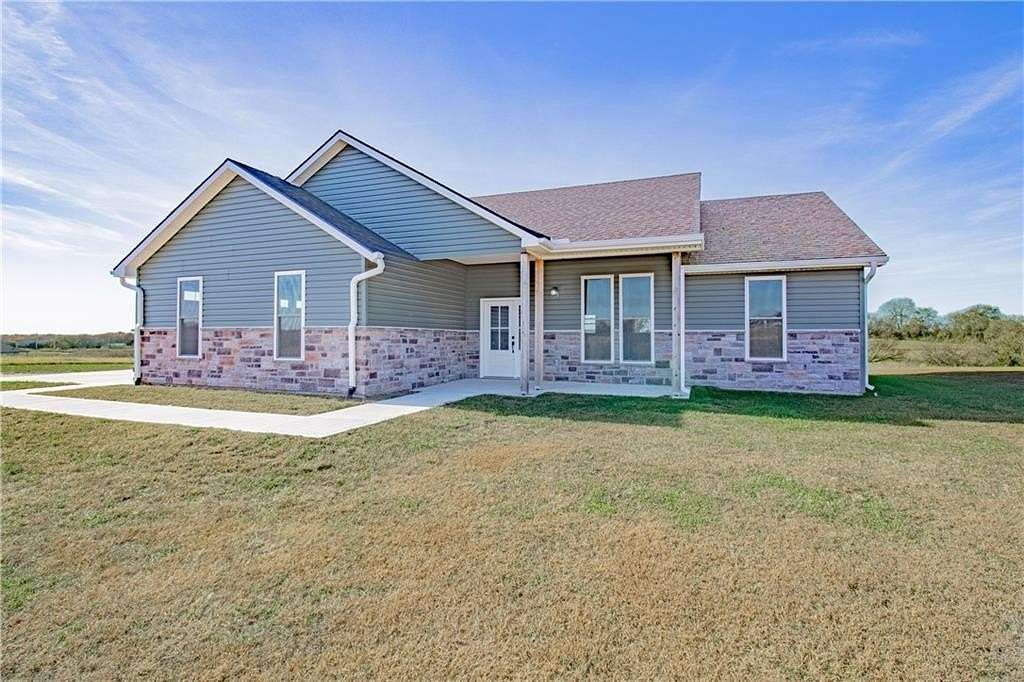 4.3 Acres of Residential Land with Home for Sale in Warrensburg, Missouri