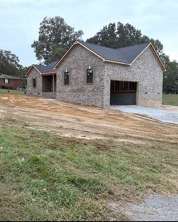 0.5 Acres of Residential Land with Home for Sale in Cadiz, Kentucky