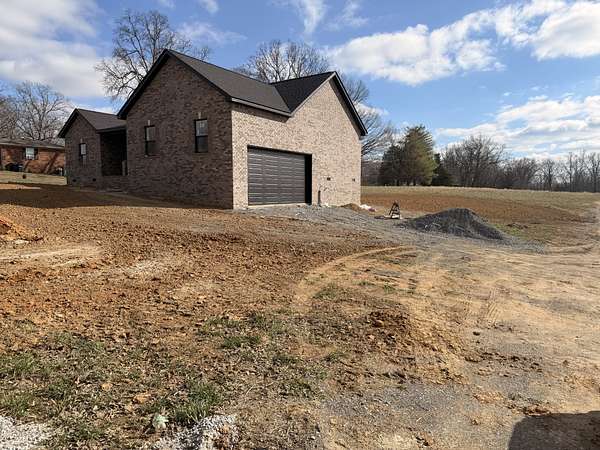 0.5 Acres of Land with Home for Sale in Cadiz, Kentucky