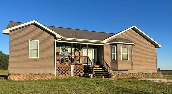 5 Acres of Residential Land with Home for Sale in Marceline, Missouri