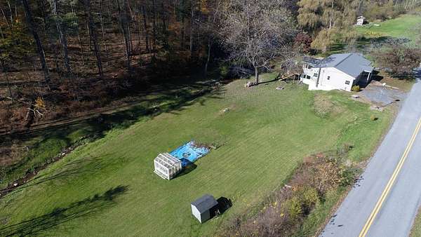 16 Acres of Land with Home for Auction in Beech Creek, Pennsylvania