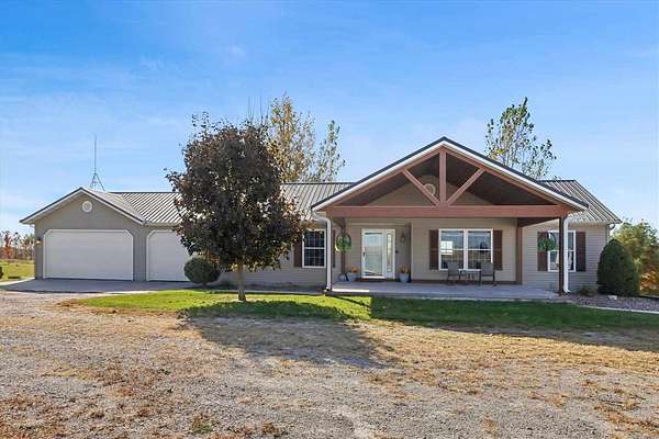 3.9 Acres of Residential Land with Home for Sale in Highland Township, Iowa