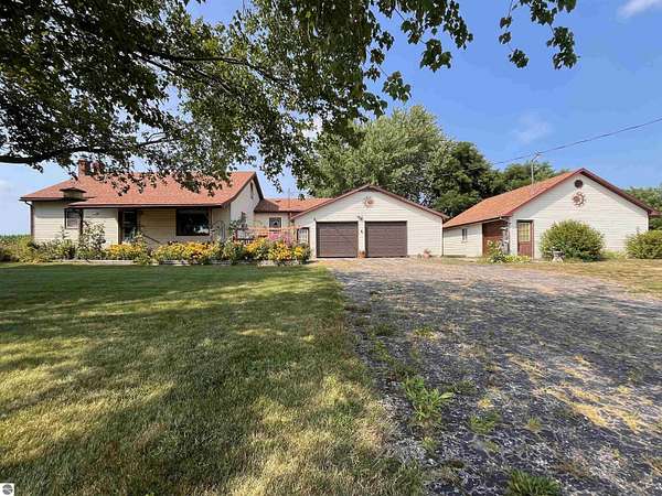 5 Acres of Residential Land with Home for Sale in Kingsley, Michigan