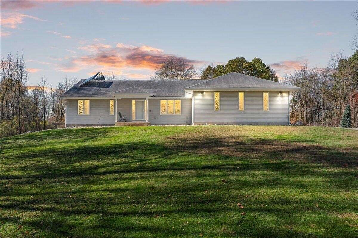 9 Acres of Residential Land with Home for Sale in Bath, Michigan