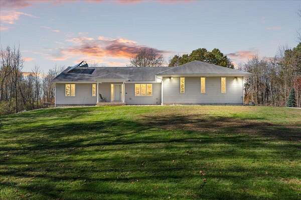 9 Acres of Residential Land with Home for Sale in Bath, Michigan