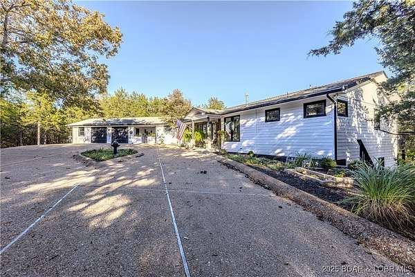 4.5 Acres of Residential Land with Home for Sale in Camdenton, Missouri