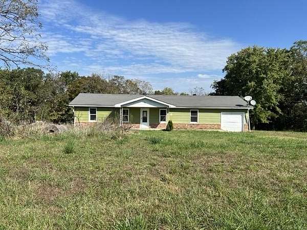 6.85 Acres of Residential Land with Home for Sale in Buffalo, Missouri