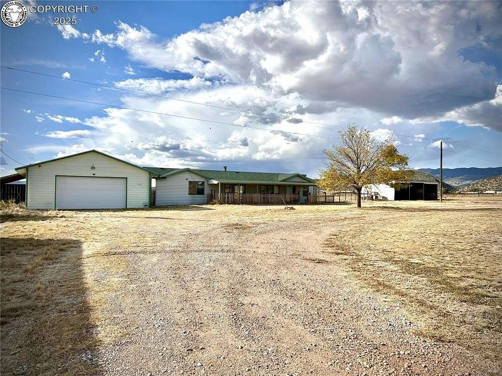 5 Acres of Residential Land with Home for Sale in Penrose, Colorado