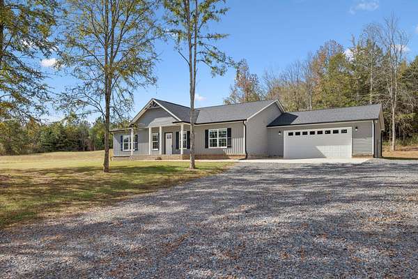 5.24 Acres of Residential Land with Home for Sale in Ooltewah, Tennessee