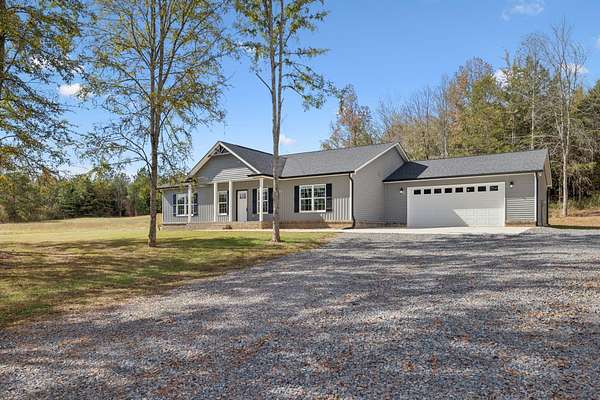 5.24 Acres of Residential Land with Home for Sale in Ooltewah, Tennessee