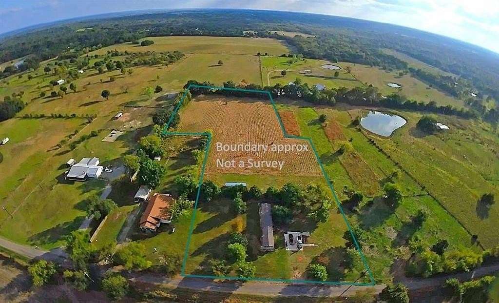 4 Acres of Residential Land with Home for Sale in Wolfe City, Texas