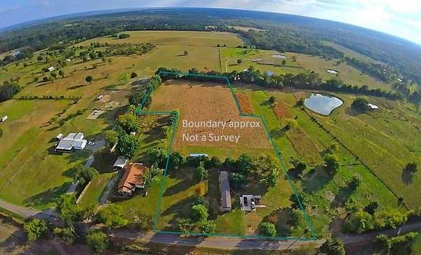 4 Acres of Residential Land with Home for Sale in Wolfe City, Texas