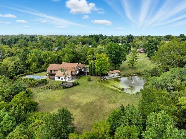 4.29 Acres of Residential Land with Home for Sale in Green Township, Ohio