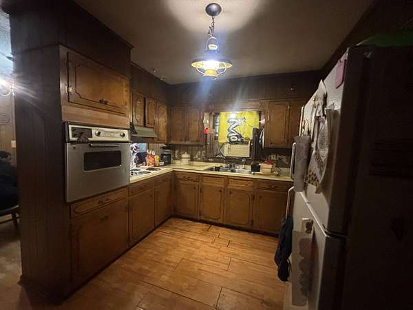 1.6 Acres of Residential Land with Home for Sale in Camden, Tennessee