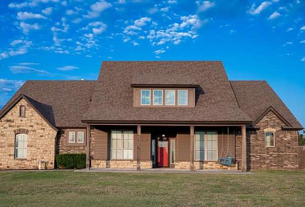 4.4 Acres of Residential Land with Home for Sale in Yukon, Oklahoma