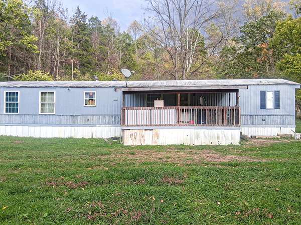 9.4 Acres of Residential Land with Home for Sale in Connersville, Indiana