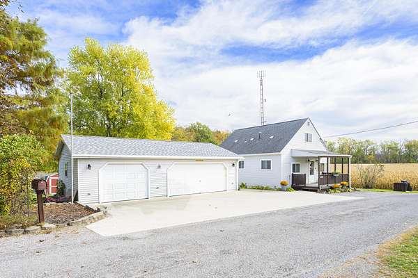 7.2 Acres of Land with Home for Sale in Russells Point, Ohio