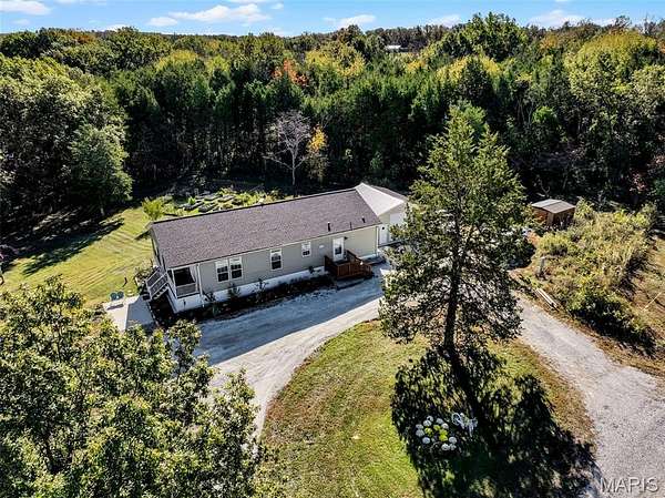 7.78 Acres of Residential Land with Home for Sale in Luebbering, Missouri