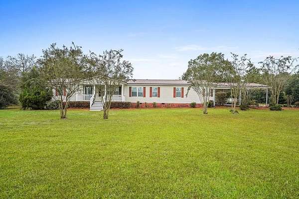 7 Acres of Residential Land with Home for Sale in Slocomb, Alabama