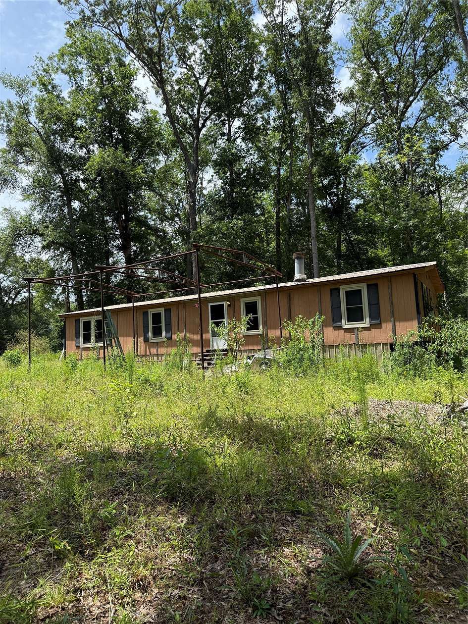 5.12 Acres of Residential Land for Sale in Elysian Fields, Texas
