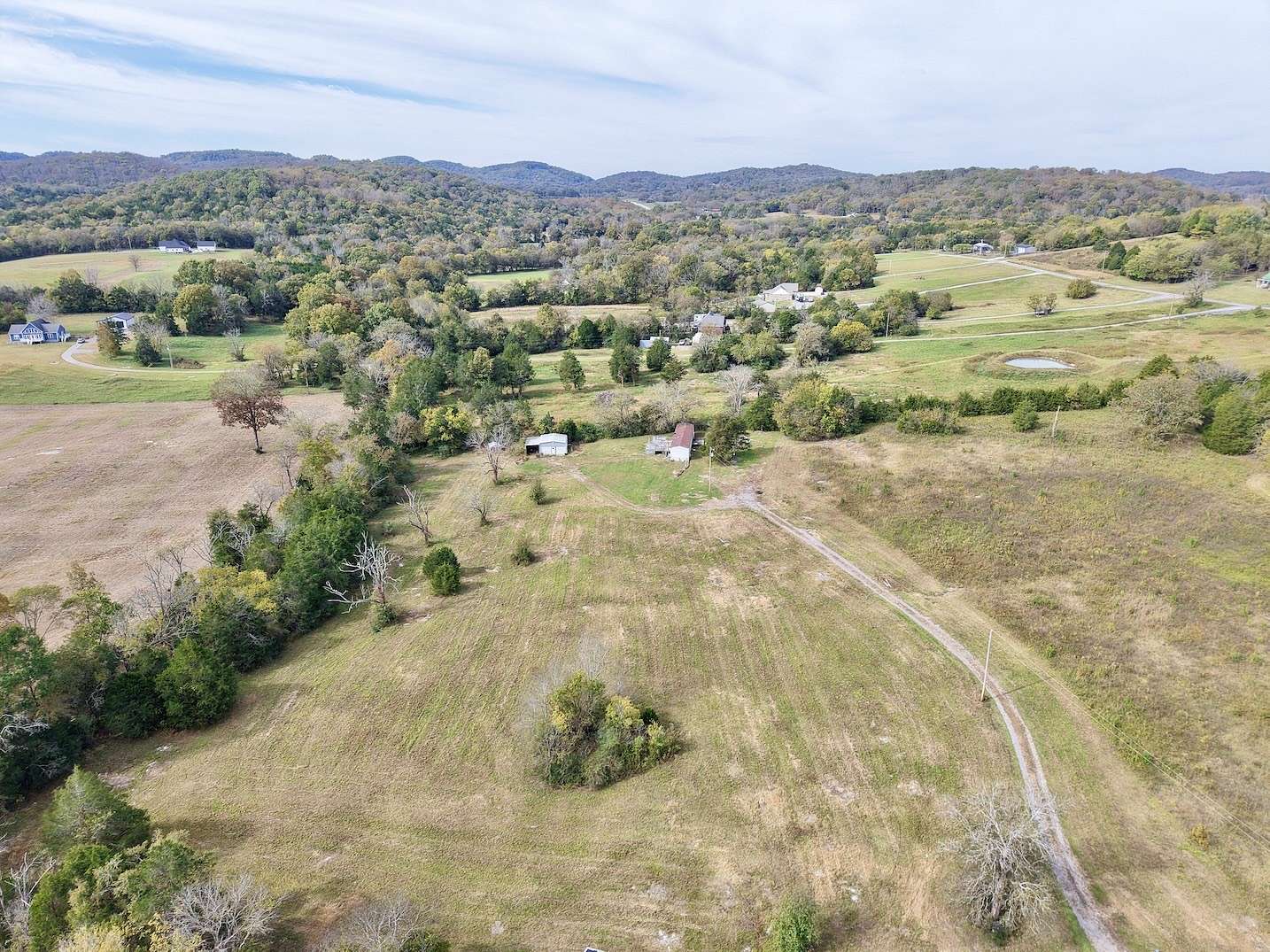 5.6 Acres of Residential Land with Home for Sale in Auburntown, Tennessee