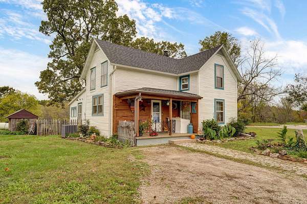 5.2 Acres of Residential Land with Home for Sale in Bois D'Arc, Missouri