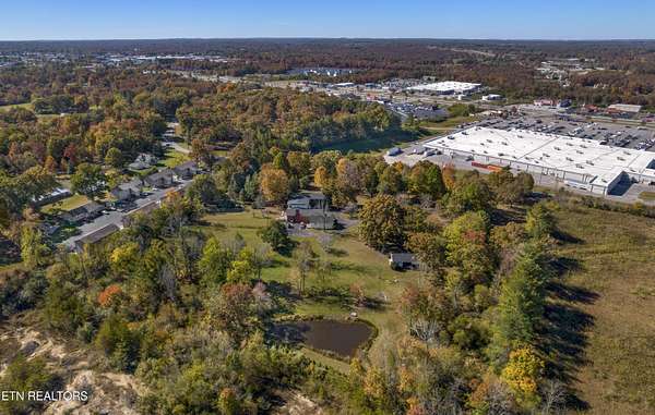 8.7 Acres of Improved Mixed-Use Land for Auction in Crossville, Tennessee