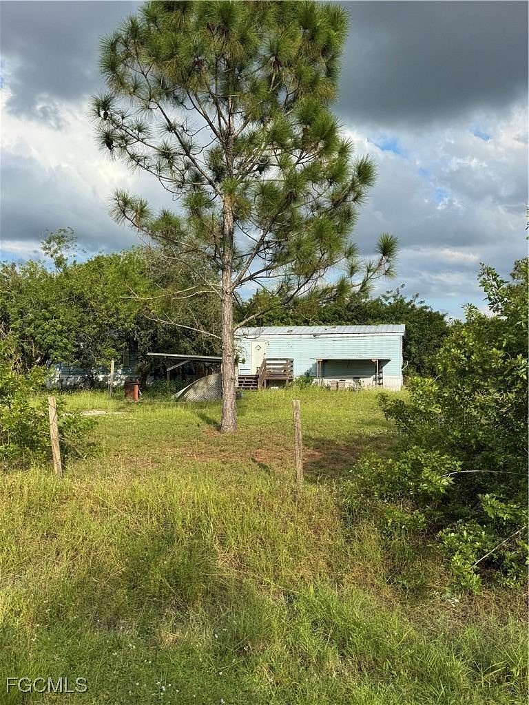 2.5 Acres of Land with Home for Sale in Clewiston, Florida
