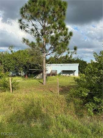 2.5 Acres of Residential Land with Home for Sale in Clewiston, Florida
