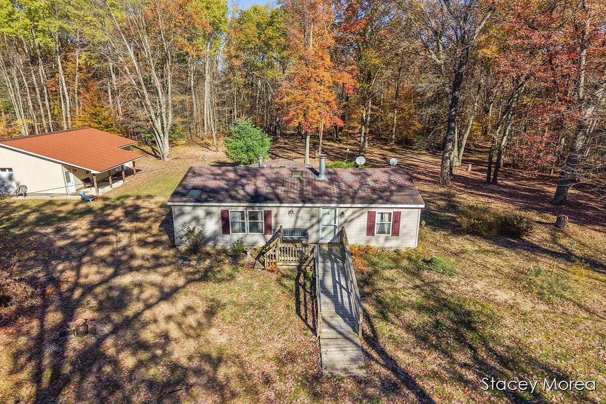 10 Acres of Residential Land with Home for Sale in White Cloud, Michigan