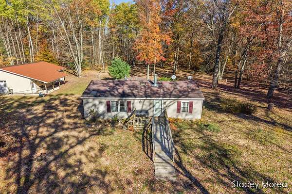 10 Acres of Residential Land with Home for Sale in White Cloud, Michigan