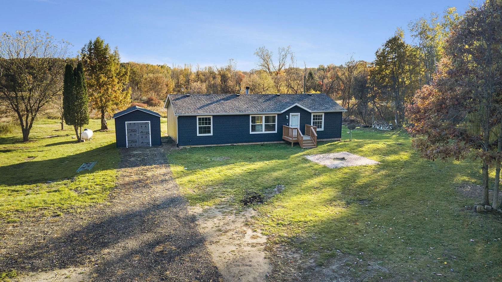 2 Acres of Residential Land with Home for Sale in Cedar Springs, Michigan