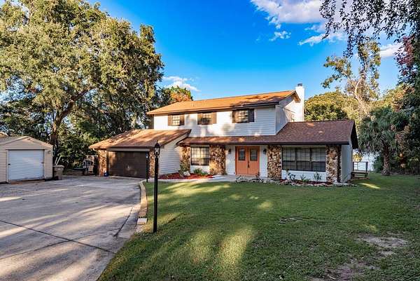 1.8 Acres of Residential Land with Home for Sale in Leesburg, Florida