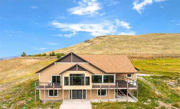 80 Acres of Recreational Land with Home for Sale in Polson, Montana