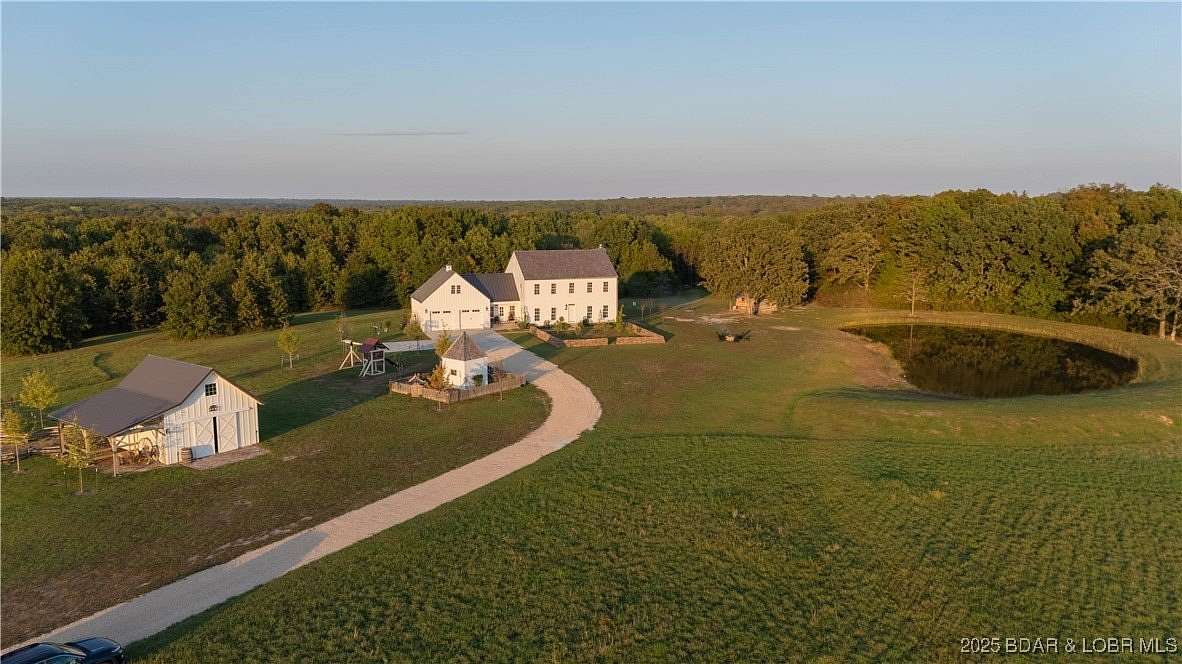 86 Acres of Recreational Land with Home for Sale in Versailles, Missouri