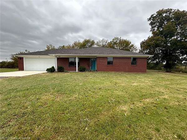 1.5 Acres of Residential Land with Home for Sale in Pocola, Oklahoma