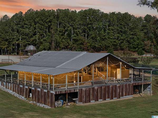 63.8 Acres of Land with Home for Sale in Delta, Alabama