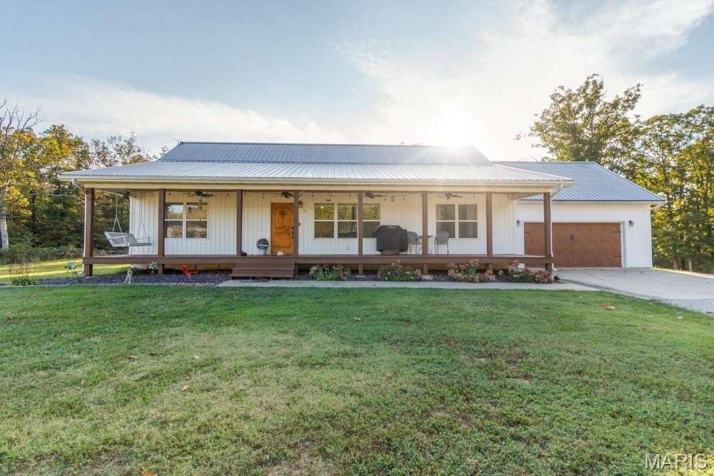 20 Acres of Land with Home for Sale in Lebanon, Missouri