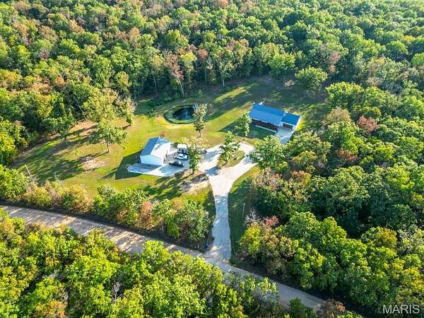 20 Acres of Land with Home for Sale in Lebanon, Missouri