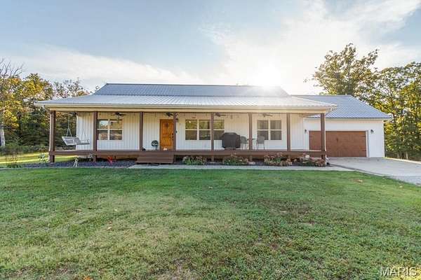 20 Acres of Land with Home for Sale in Lebanon, Missouri