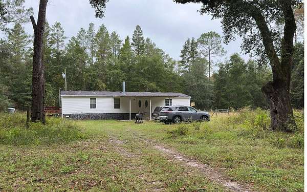 5 Acres of Land with Home for Sale in Lake City, Florida
