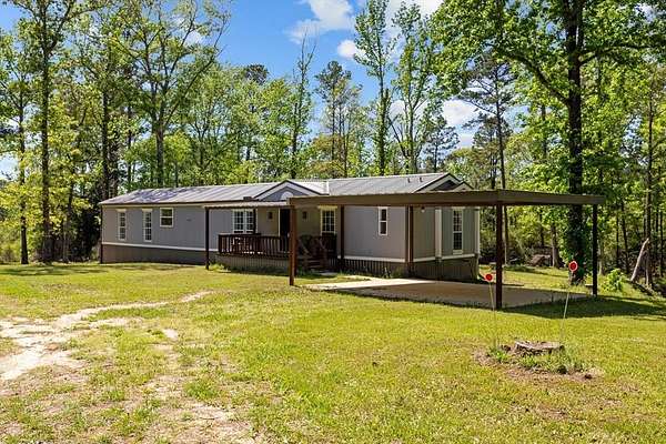 2 Acres of Residential Land with Home for Sale in Grapeland, Texas