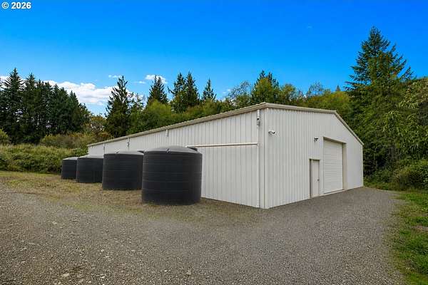 9.68 Acres of Land with Home for Sale in Rainier, Oregon